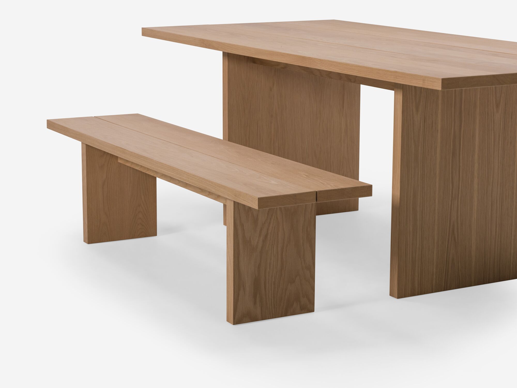Detail view of oak dining bench and matching table